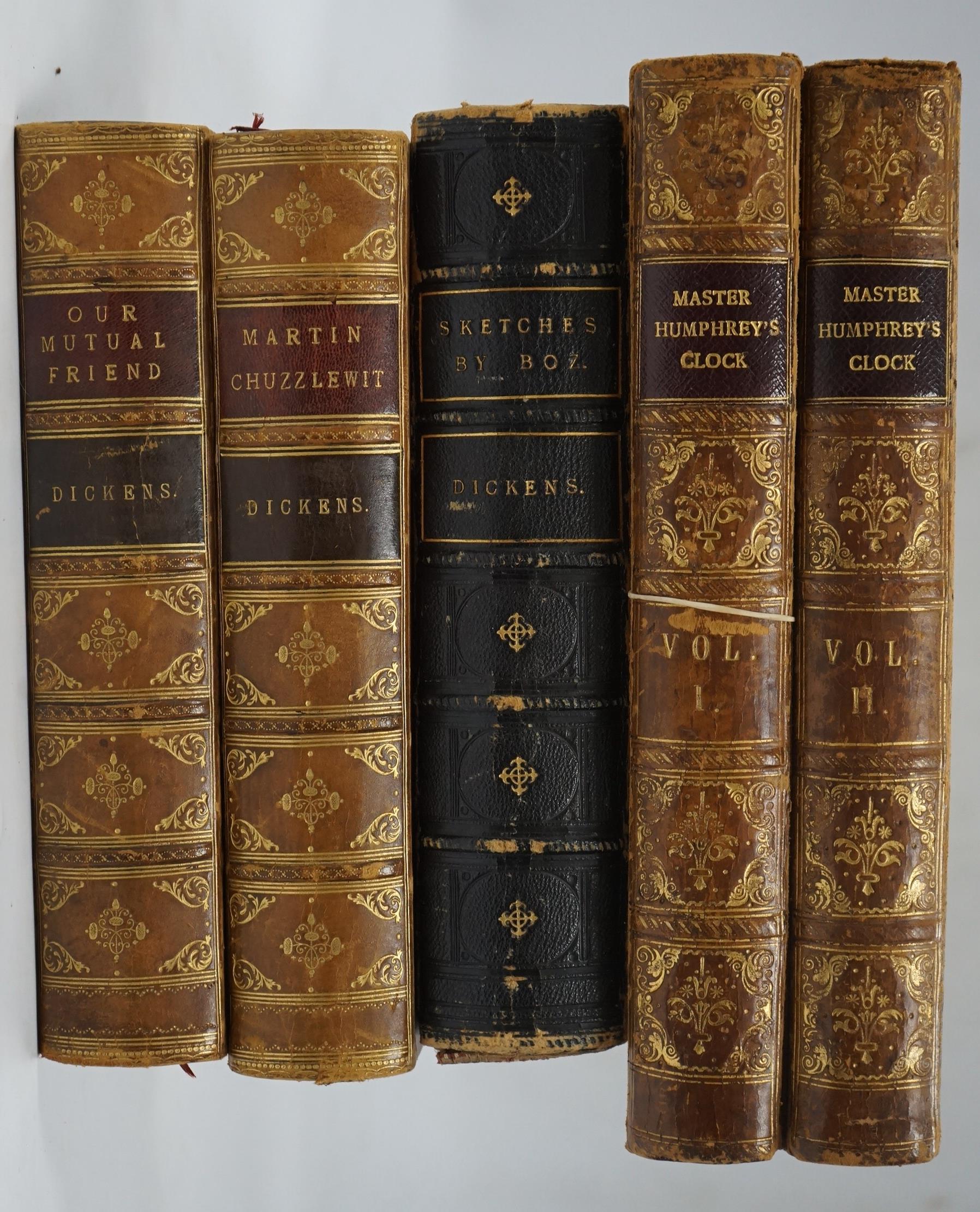 Dickens, Charles - Our Mutual Friend. (new edition), 2 vols. (bound together). pictorial general title, frontispieces and 38 plates; contemp. half calf and marbled boards, gilt decorated panelled spine with red and brown